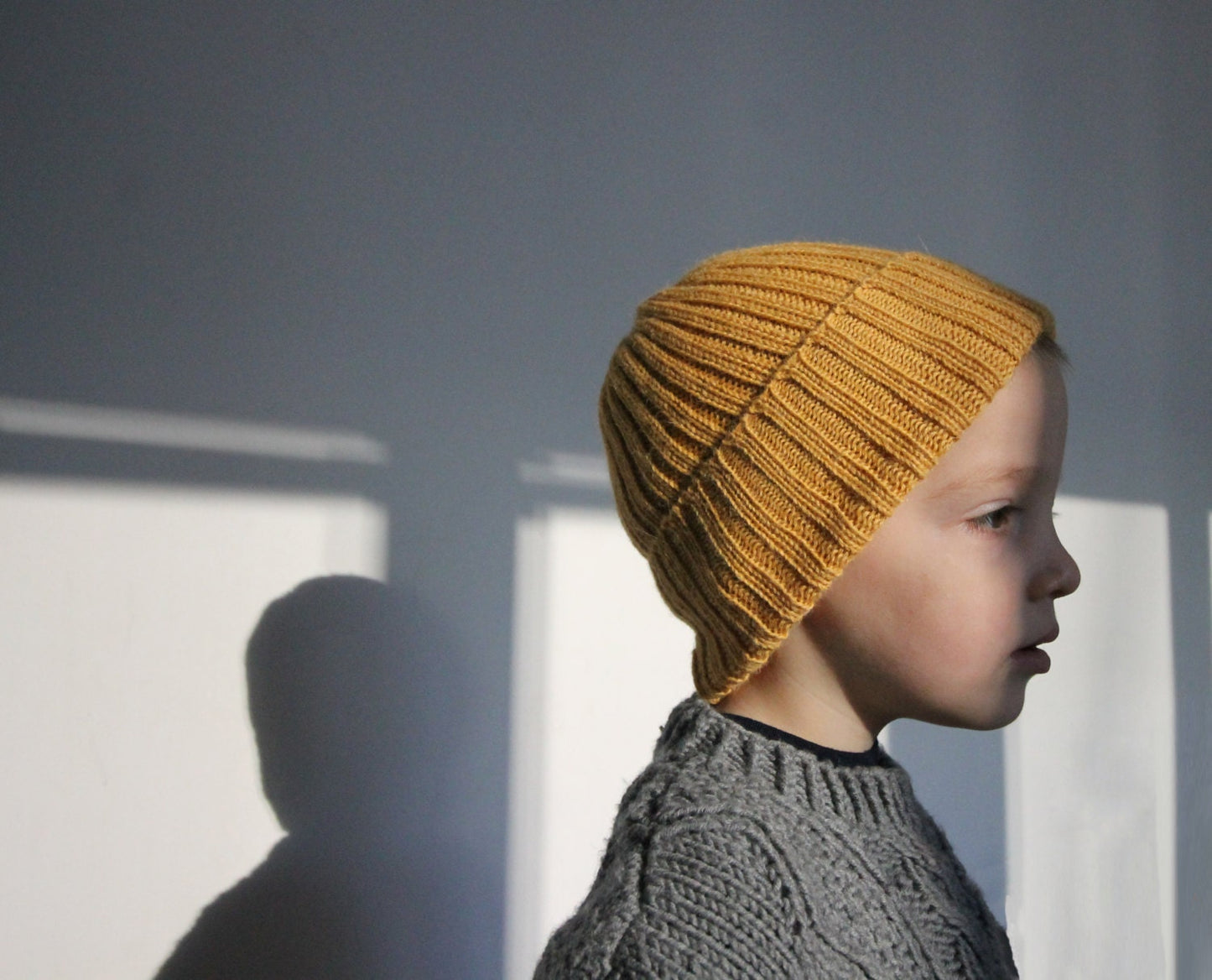 Mustard-Yellow knitted 100% alpaca beanie hat for babies, toddlers & children. Handcrafted in Scotland. Unisex watch cap.