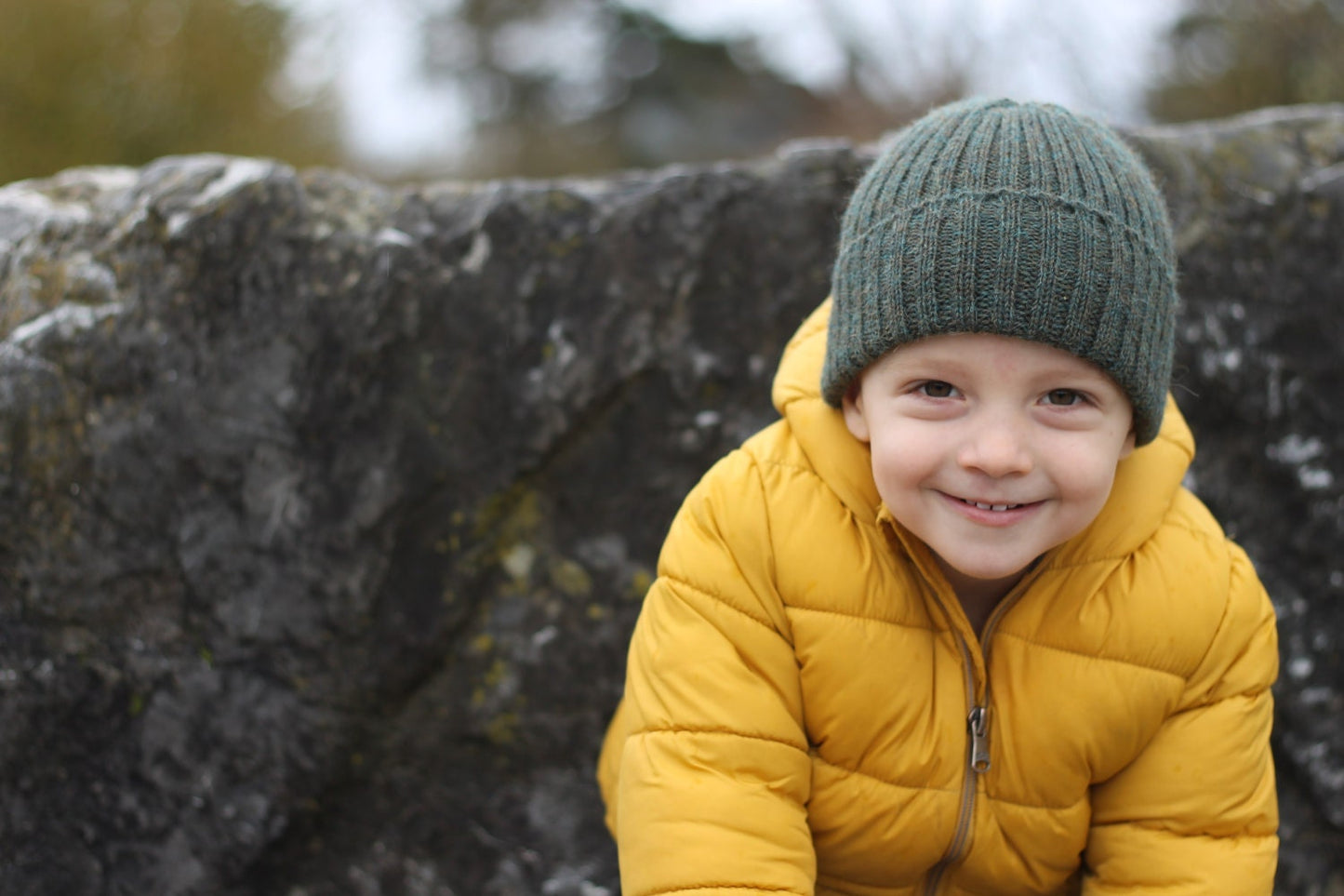 Moss green knitted alpaca beanie hat for babies, toddlers and children. Handcrafted in Scotland. Newborn gift.