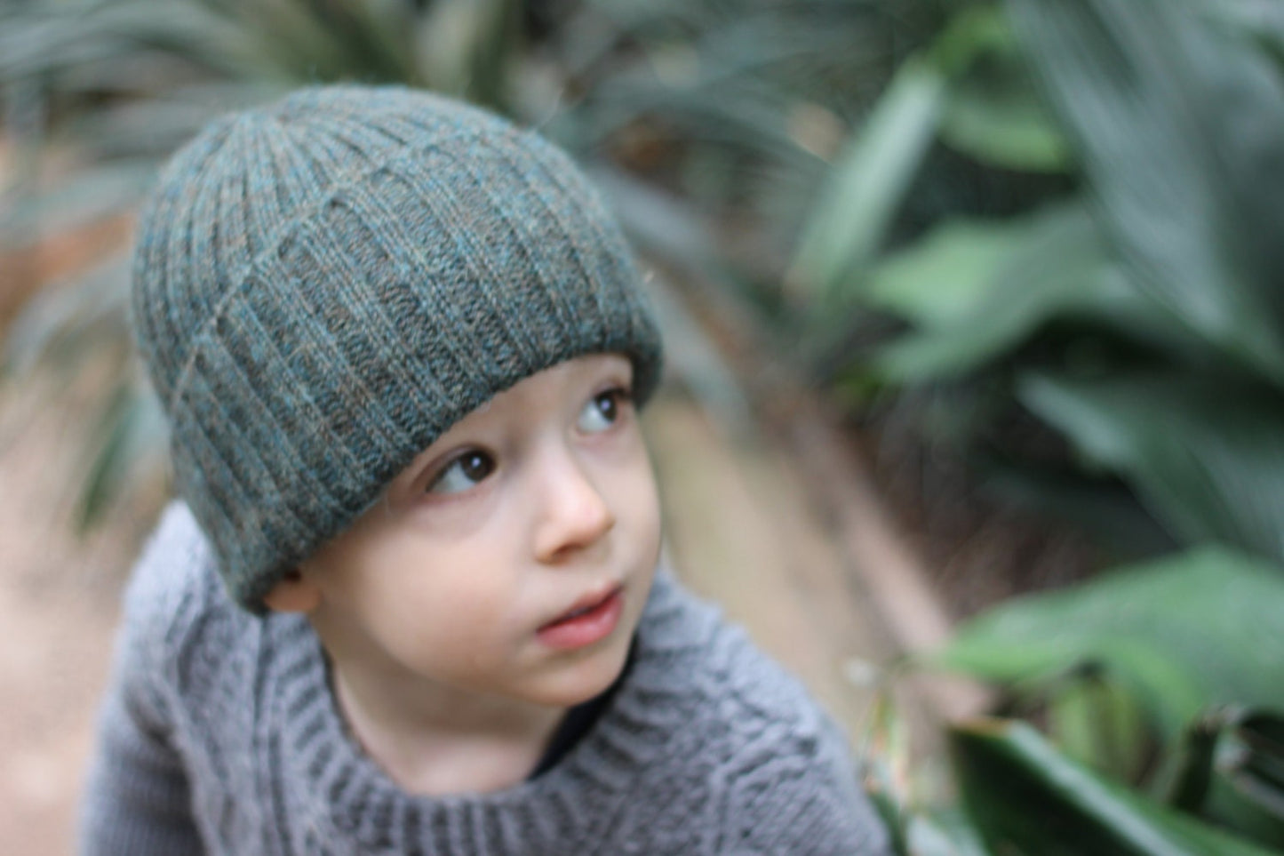 Moss green knitted alpaca beanie hat for babies, toddlers and children. Handcrafted in Scotland. Newborn gift.