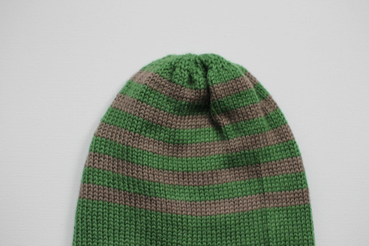 Green and brown knitted baby beanie hat made from 100% merino wool - Made in Scotland