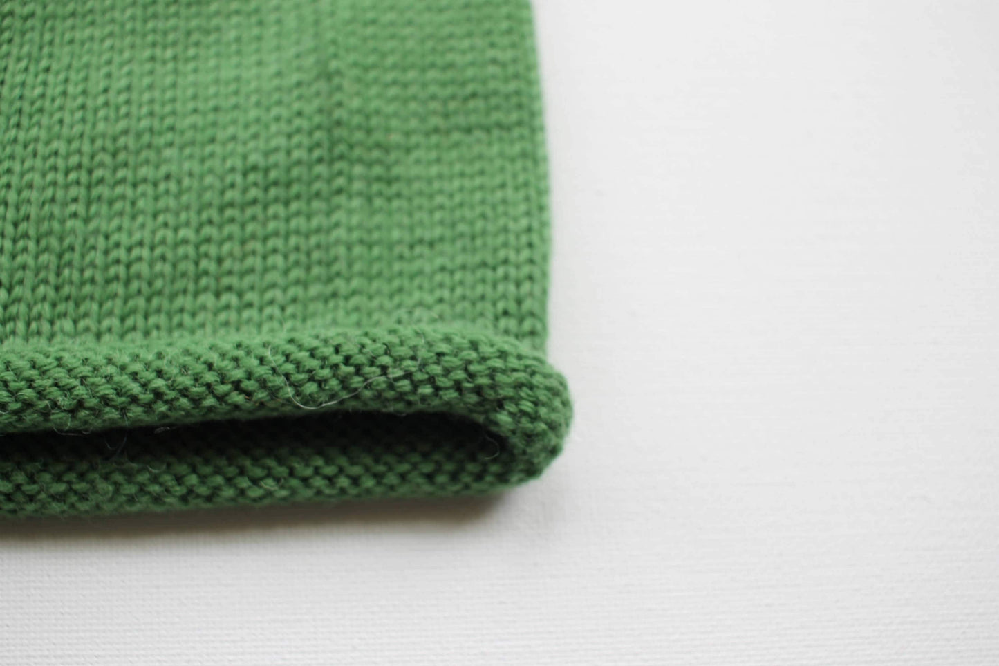 Green and brown knitted baby beanie hat made from 100% merino wool - Made in Scotland