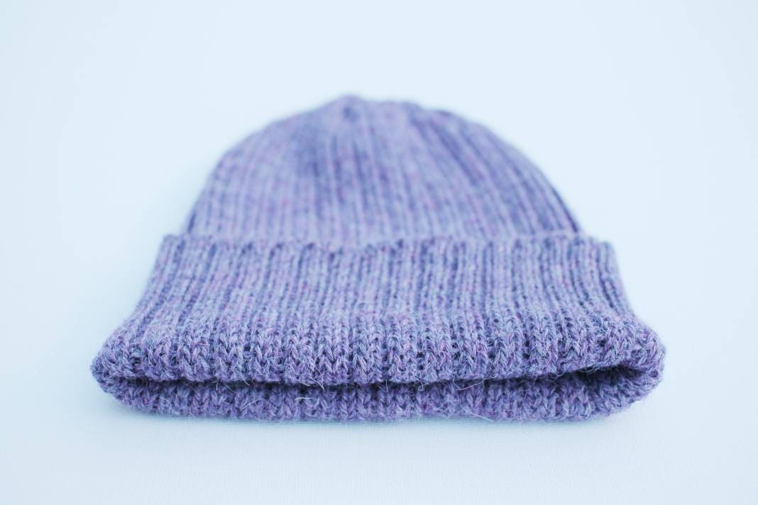 Lavender (light purple) knitted alpaca beanie hat for babies, toddlers and children. Handcrafted in Scotland. Unisex design. Newborn gift.