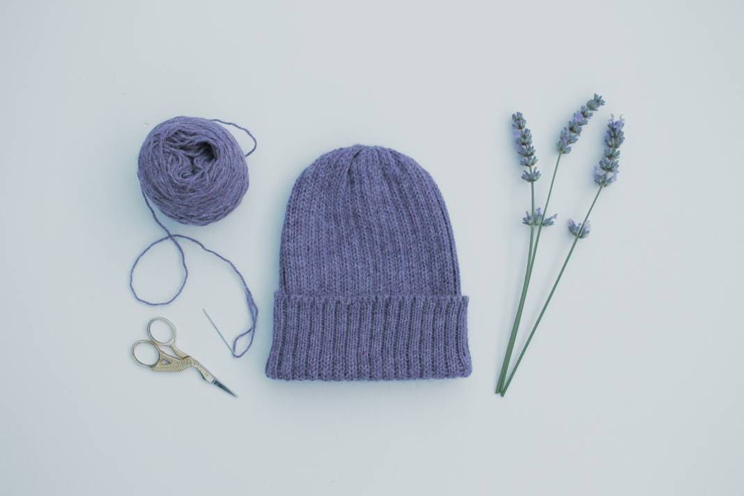 Lavender (light purple) knitted alpaca beanie hat for babies, toddlers and children. Handcrafted in Scotland. Unisex design. Newborn gift.