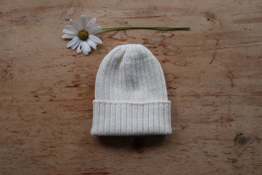 Ecru/ off-white knitted 100% alpaca beanie hat for babies, toddlers & children. Handcrafted in Scotland. Unisex cream watch cap.