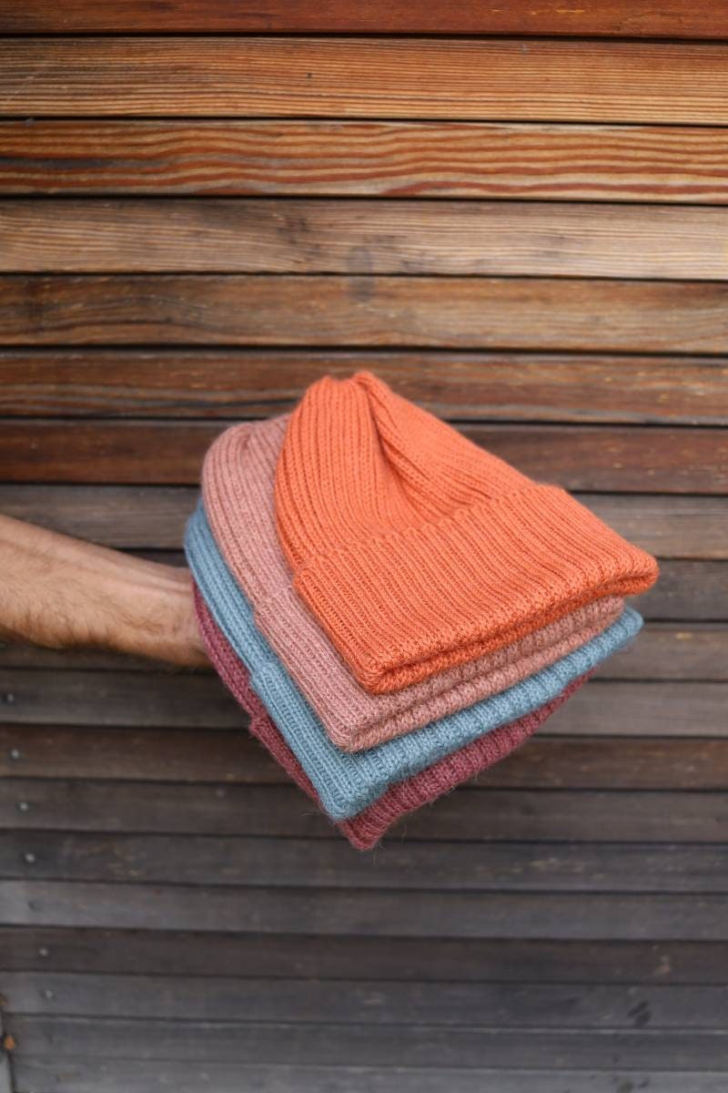 Sherbet orange knitted alpaca beanie hat for babies, toddlers and children. Handcrafted in Scotland. Unisex design.