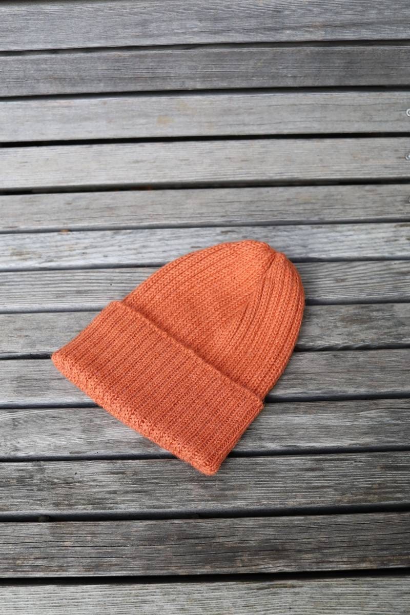 Sherbet orange knitted alpaca beanie hat for babies, toddlers and children. Handcrafted in Scotland. Unisex design.