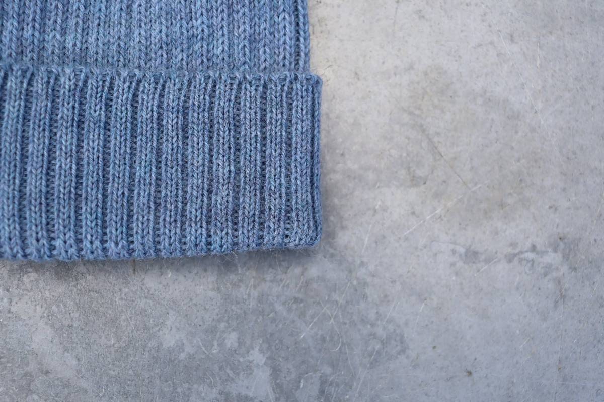 Fog / Light Blue Adult Beanie. 100% Alpaca - Handcrafted in Scotland. Knitted Unisex 2 x 2 ribbed beanie hat.