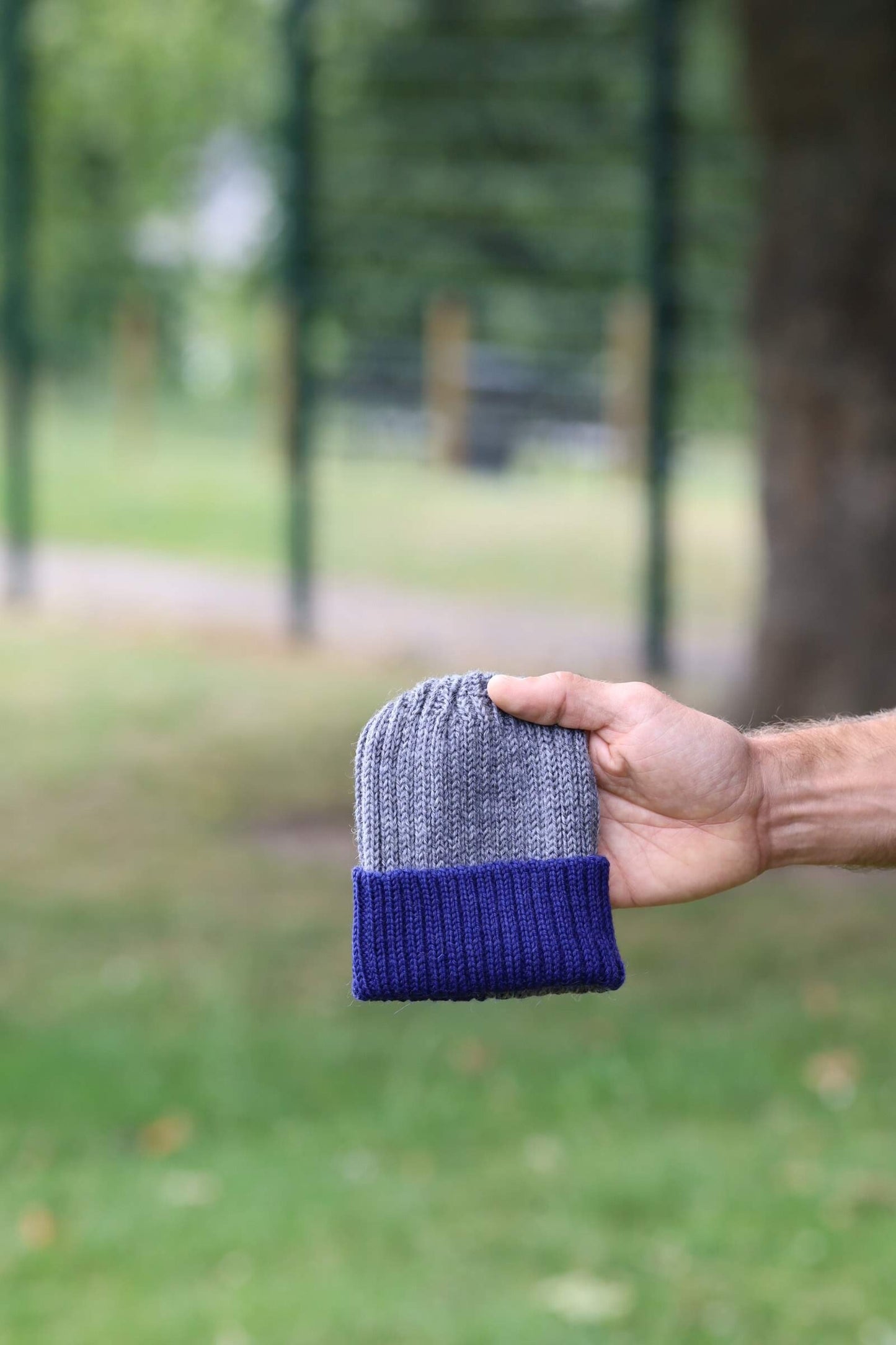 Medium grey/navy knitted 100% alpaca beanie hat for babies, toddlers & children. Handcrafted in Scotland. Unisex newborn watch cap.