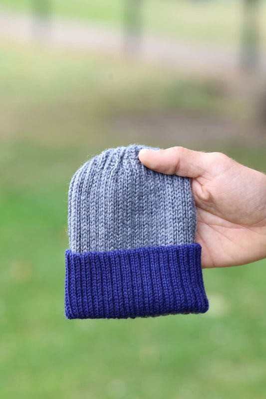 Medium grey/navy knitted 100% alpaca beanie hat for babies, toddlers & children. Handcrafted in Scotland. Unisex newborn watch cap.