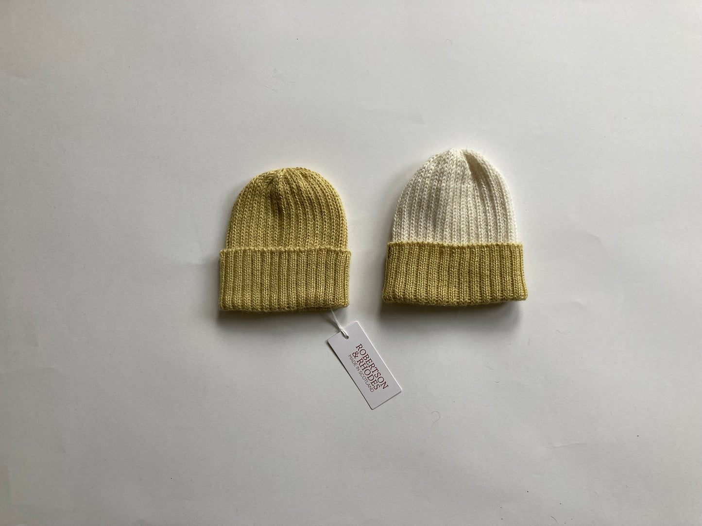 Lemon/ecru knitted 100% alpaca beanie hat for babies.  Handcrafted in Scotland. Unisex lemon/ecru watch cap.