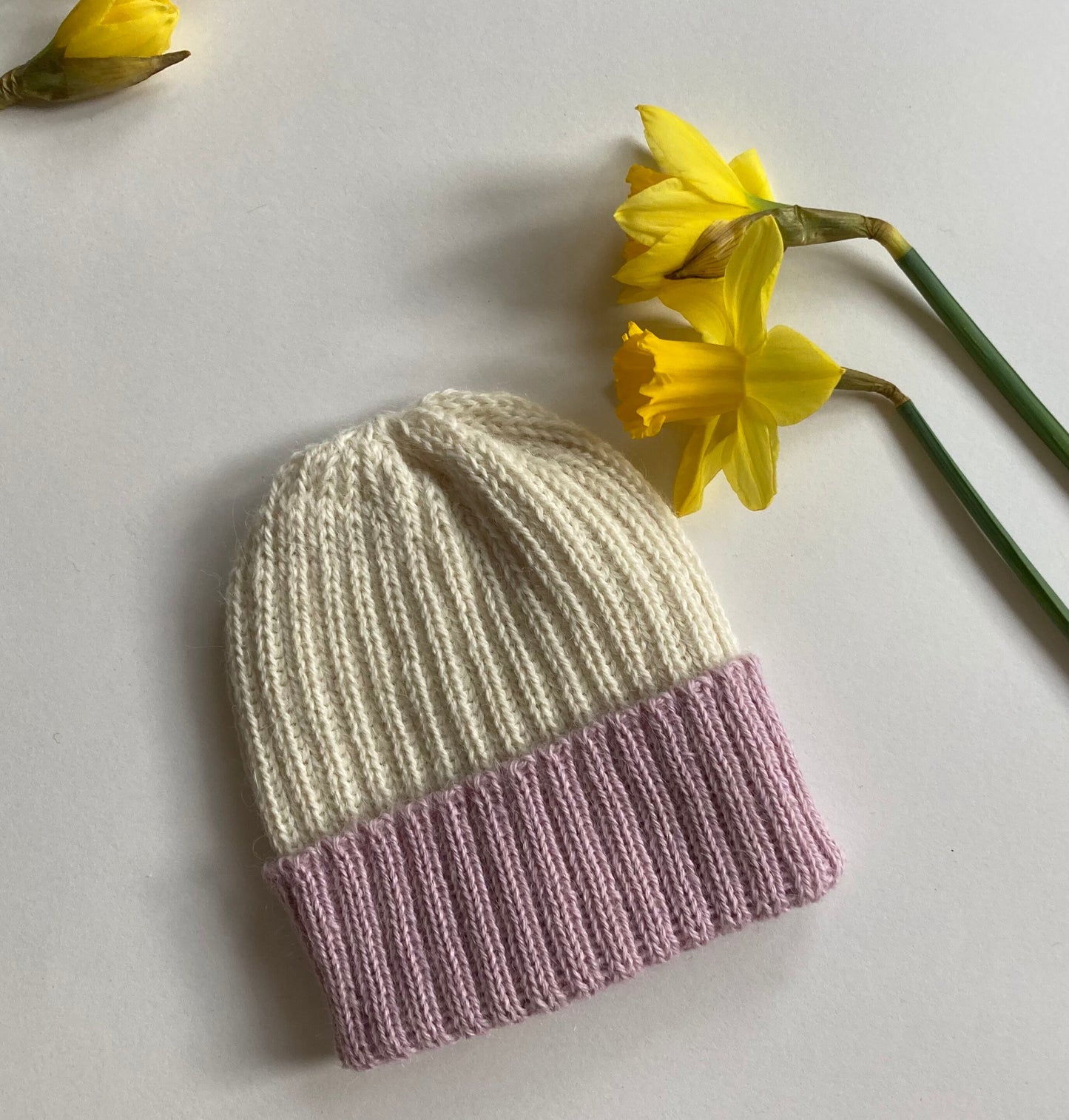 Dusty pink/ecru knitted 100% alpaca beanie hat for babies.  Handcrafted in Scotland. Unisex dusty pink/ecru watch cap.