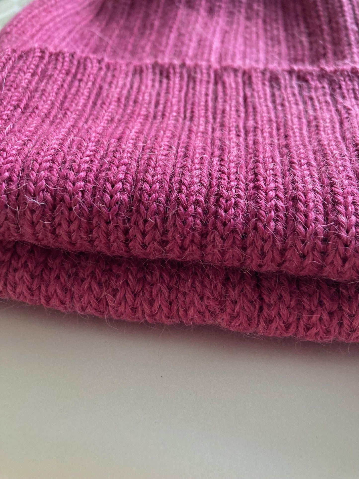 Bright Pink Adult Beanie. 100% Alpaca - Handcrafted in Scotland. Knitted Unisex 2 x 2 ribbed beanie hat.