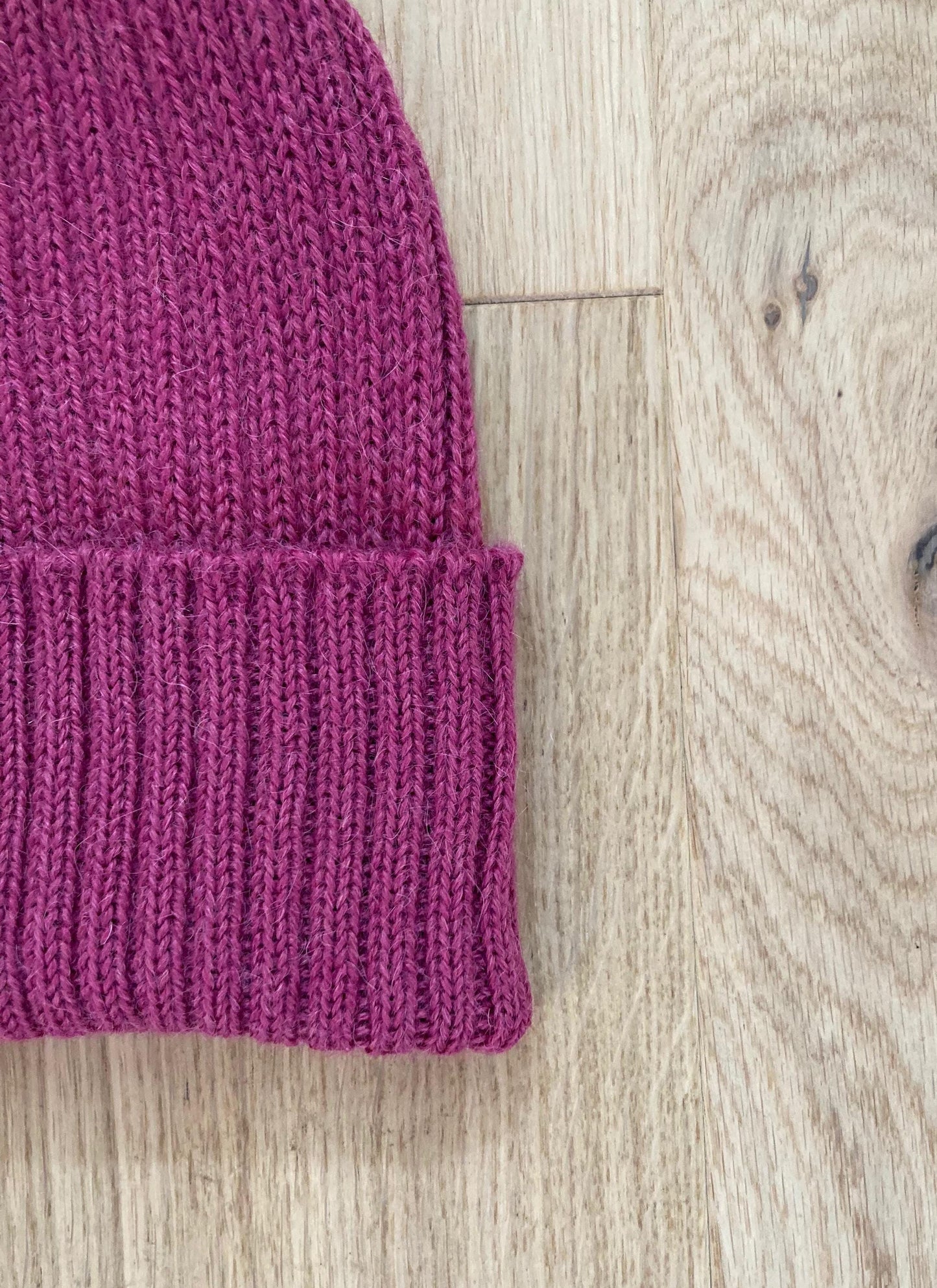 Bright Pink Adult Beanie. 100% Alpaca - Handcrafted in Scotland. Knitted Unisex 2 x 2 ribbed beanie hat.