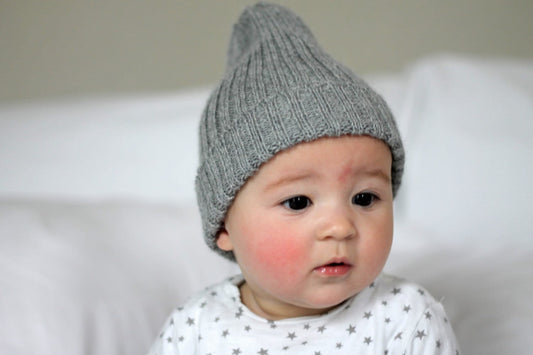 Light grey knitted alpaca beanie hat for babies, toddlers and children. Handcrafted in Scotland. Newborn gift.